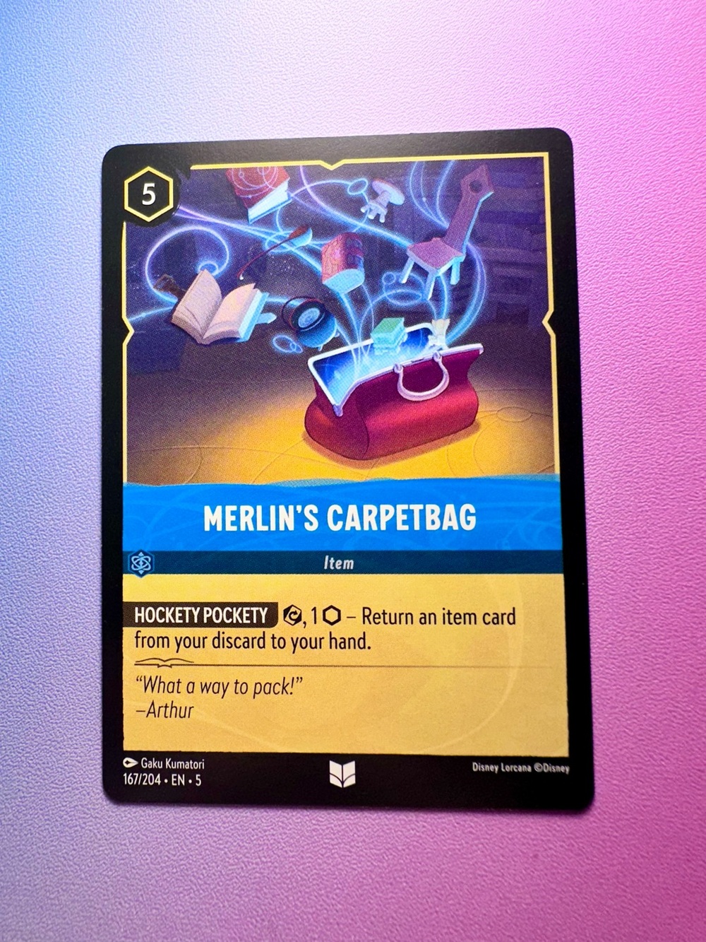 merlin’s carpetbag [sword in the stone] - 167/204 — lorcana: shimmering skies